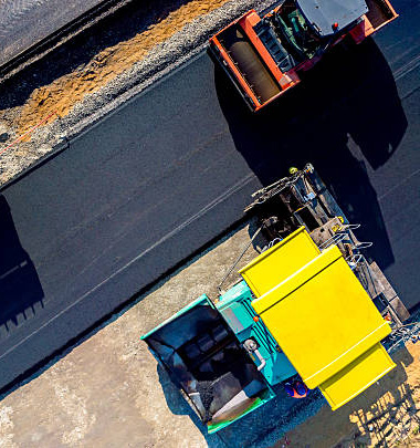 Aerial view on the new asphalt road under construction